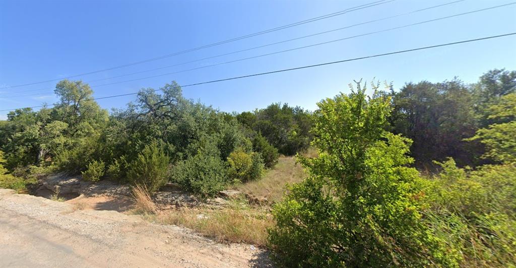 Discover the perfect place to build in Canyon Creek. This residential lot offers water and electricity at the street, with septic needed. Canyon Creek features a guarded gate, clubhouse, community pool, fishing pier, tennis courts, multiple boat ramps, lake access, and a playground. Located just minutes from Downtown Granbury, this property offers a great mix of convenience and peaceful living.