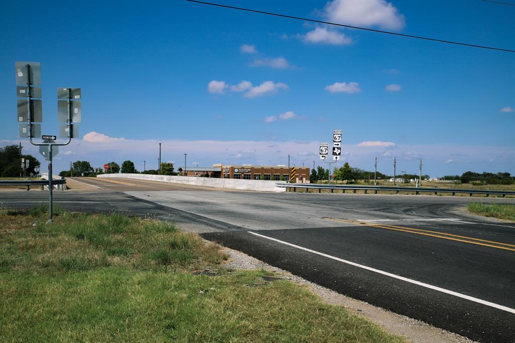 79+- ACRES OF PRIME COMMERCIAL DEVELOPMENT!! High traffic location in Cleburne, TX at US Hwy 67 and Kilpatrick Ave, with frontage stretching to Doty Road which is one exit from The Depot at Cleburne Station and the new Amazon operations facility currently under construction that spans approximately 1.7 million square feet and will create over 1000 jobs, solidifying Cleburne's position as a key logistics and commercial hub in North Texas. This location is minutes from Fort Worth and the anticipated growth in this area has plans for the Chisholm Trail Parkway to be expanding to accommodate Cleburne's rapid growth and increasing traffic demand. Fort Worth has officially become the fourth largest city in Texas surpassing Austin which makes this location so attractive for commercial development.  
WILL DIVIDE IF THE OPPORTUNITY CREATES THE VISION FOR THIS PRIME DEVELOPMENT LOCATION. There are currently 2 dwellings, barns, sheds, etc. on property.