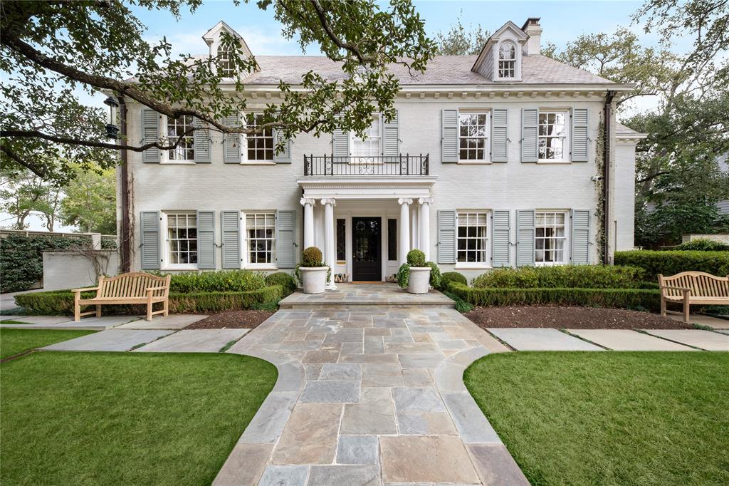 Discover timeless sophistication in this Hal Thomson-designed masterpiece, located in the prestigious French Streets. With 5 bedrooms, 6.2 baths, and three meticulously designed levels, this residence combines historic craftsmanship with modern luxury.
The exterior features a slate roof, intricate ironwork, and two grand live oaks framing the entry. Inside, a welcoming foyer flows into formal living and dining spaces adorned with crown molding. A sunroom off the formal living area features French doors that lead to a backyard oasis.
The chef’s kitchen is a culinary dream, showcasing marble countertops, a stainless steel island, a commercial-grade range, two Miele dishwashers, and Sub-Zero appliances. A butler’s pantry with a Sub-Zero wine refrigerator, additional storage, and a walk-in pantry enhances functionality. A utility room with a mudroom and powder bath completes the main level.
The backyard is an entertainer’s paradise, featuring a covered loggia, an outdoor fireplace, a pool and spa, lush hedges, and a privacy-enhancing brick wall with original detailing. An electric gate provides access to the three-car garage with an electric car charger.
On the second floor, the primary suite offers custom drapes, a private vine-covered terrace, and a spa-like bath with a barrel ceiling, dual vanities, and an expansive dressing room with mirrored doors and abundant storage.
Two additional bedrooms share a central living space, perfect for a study or kids' retreat, with each bedroom featuring a private en-suite marble bath and walk-in closet with built-ins. A third bedroom also includes an en-suite bath and walk-in closet. A second utility room adds convenience.
The third level offers a versatile retreat, including a lounge area, a game room and a bathroom that could be converted into a guest apartment.
This exceptional home blends architectural heritage with modern amenities, creating a rare opportunity in one of the city’s most sought-after neighborhoods.