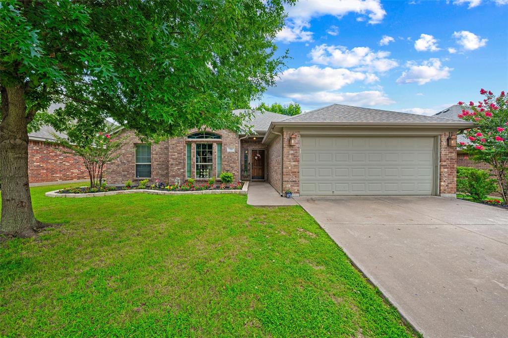 Just around the corner from the neighborhood park, playground, and pickle ball courts, this 3-bedroom, 2-bath home offers a functional layout in one of Burleson's established neighborhoods. The open living area is centered around a wood-burning fireplace and flows into the dining space and kitchen with abundant cabinet storage and a breakfast bar. The private primary suite features dual vanities, a soaking tub, separate shower, and walk-in closet. Outside, you'll find a covered patio, mature shade trees, and a fully fenced backyard with room to enjoy. Conveniently located just minutes from H-E-B Plus, Old Town Burleson, local restaurants, shopping, Chisholm Trail Parkway, and I-35W.