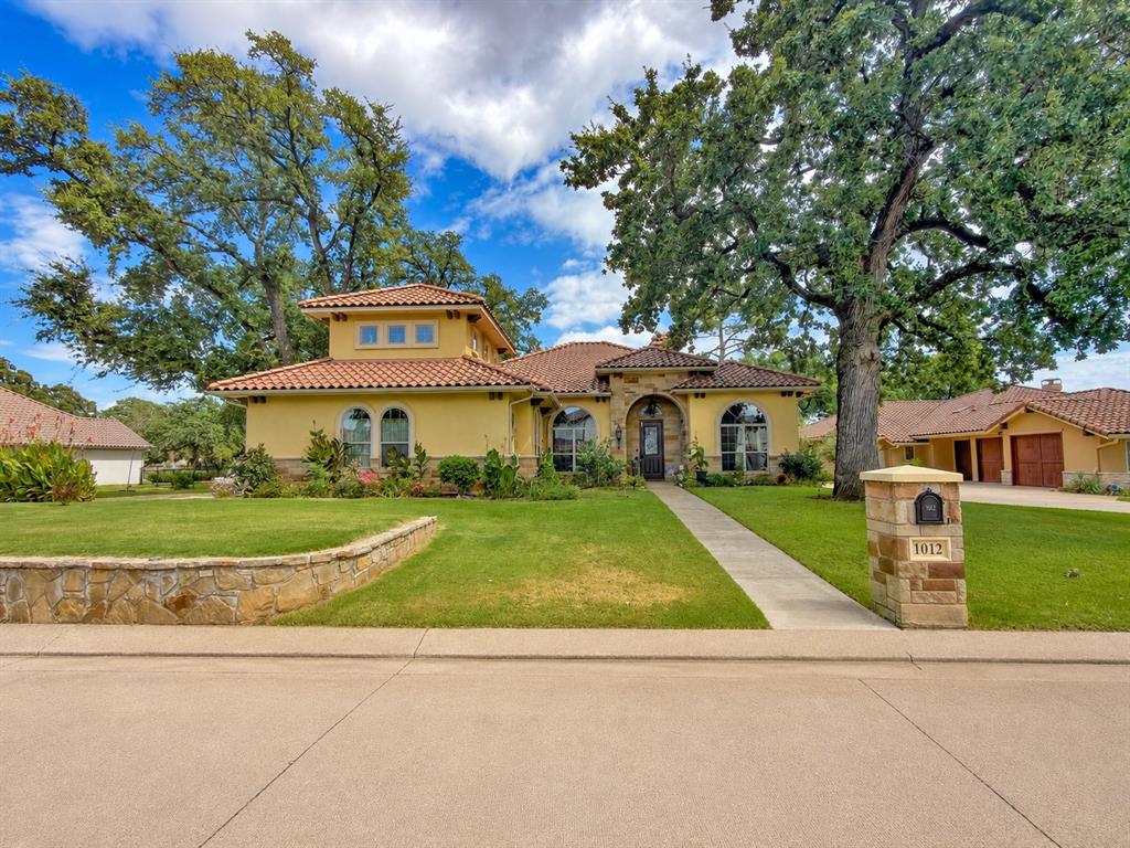 Experience refined living in this stunning Mediterranean-style residence, thoughtfully designed with elegance, comfort, and exceptional functionality in mind. Boasting 3 spacious bedrooms, 3.5 baths, and a versatile upstairs game room or flex space with a full bath, this home offers a sophisticated blend of luxury and everyday livability. The expansive open-concept floor plan is enhanced by split-bedroom functionality, providing both privacy and seamless flow for entertaining. At the heart of the home, the gourmet chef’s kitchen is a true showpiece, featuring a gas cooktop, double ovens, an oversized island with breakfast bar seating, walk-in pantry and abundant preparation and storage space. Retreat to the luxurious primary suite, where a spa-inspired ensuite bath creates a private sanctuary for relaxation. Generously sized secondary bedrooms offer comfort and style, while the well-appointed Jack-and-Jill bath features dual vanities for added convenience. Additional highlights include a spacious laundry room with custom built-in cabinetry, exceptional storage throughout, new Anderson Security Door.  Step outside to the expansive covered patio, an inviting outdoor living space perfectly suited for entertaining guests or enjoying quiet evenings at home. Nestled within the sought-after Catalina Bay community, this exceptional residence showcases timeless Mediterranean architecture, elevated finishes, and thoughtfully curated spaces designed for the most discerning homeowner.