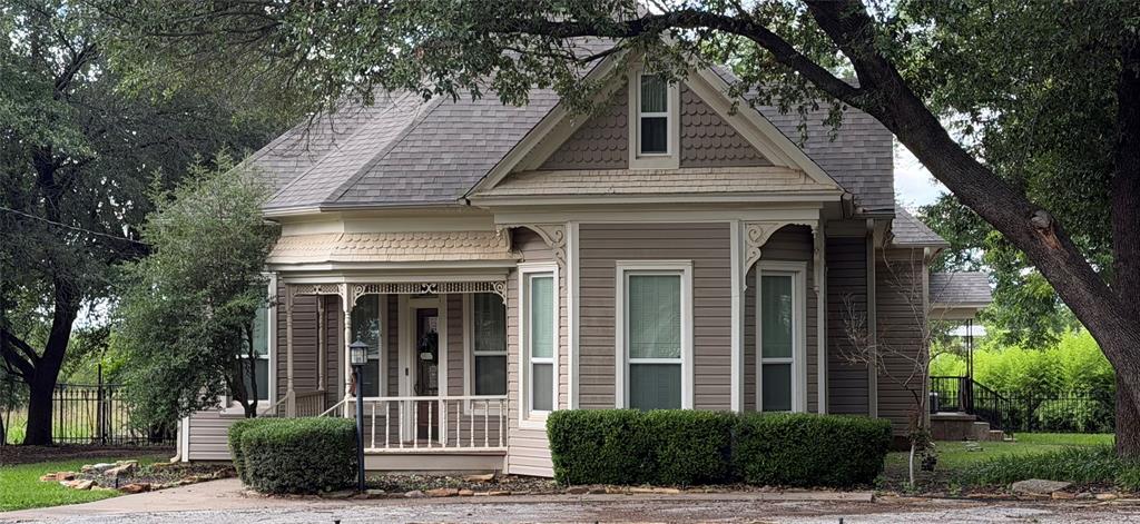 Here’s a tightened MLS version crafted to stay under a typical 2,000-character limit while keeping the strongest selling points:
Historic Victorian home in the heart of Jacksboro offering over 4,100 sq ft of updated living space with timeless character and modern functionality. Built in the early 1900s, this property sits on 1.37 acres shaded by mature oak trees planted in the 1920s and offers potential as a bed & breakfast.
Inside, you’ll find original architectural details, hardwood floors, period millwork, stained glass windows, and built-in features that highlight the home’s craftsmanship. The chef’s kitchen opens to spacious living and dining areas, ideal for entertaining. Two downstairs living areas and a fireplace provide flexibility for everyday living.
The oversized primary en suite features generous closet space, a jetted tub, and a separate shower. Upstairs, a stunning staircase leads to a bright living area with a wall of windows overlooking the property, along with four bedrooms—two with private en-suites.
A detached garage with apartment space offers excellent potential for guests, extended family, or income-producing use.
Positioned toward the rear of the property for added privacy, the grounds are beautifully maintained and include a charming gazebo and an oversized back porch, perfect for relaxing or entertaining.

This unique property blends historic charm, space, and versatility in a prime Jacksboro location.

If you want it even tighter (some MLS systems are strict at ~1,000–1,500), I can compress it further without losing impact.