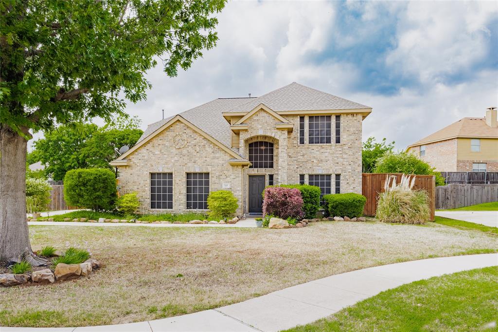 Tucked at the end of a quiet cul-de-sac in Sachse’s Quail Hollow Estates, this thoughtfully designed home offers the space, flexibility and privacy that are increasingly hard to find. Set on an oversized quarter-acre lot with minimal through traffic, the setting feels peaceful from the moment you arrive.

Inside, hardwood floors, a sweeping curved staircase and a two-story foyer create a warm welcome. The family room centers around a gas-log fireplace with built-in shelving and opens seamlessly to the kitchen, making the layout ideal for both entertaining and everyday living. The kitchen features a center island, generous prep space and a breakfast area overlooking the backyard, the kind of space where mornings begin slowly and conversations linger after dinner.

The first-floor primary suite provides a private retreat with dual vanities, a soaking tub, separate shower and walk-in closet. A dedicated home office offers flexibility for remote work or quiet focus. Upstairs, the spacious game room and separate media room create room for movie nights, hobbies, guests or a second living area without everyone feeling crowded.

Step outside and the backyard is built for gathering. A covered patio opens to an extended paver-stone entertaining area complete with a built-in grill station, stacked stone bar, and plenty of room to enjoy the oversized lot. The cul-de-sac location adds extra privacy and a quieter feel that the owners love.

Located in Quail Hollow Estates, residents enjoy larger homesites, a community pool, convenient access to Highway 78, Firewheel Town Center, President George Bush Turnpike and nearby shopping and dining. Zoned to highly regarded Wylie ISD in Collin County.