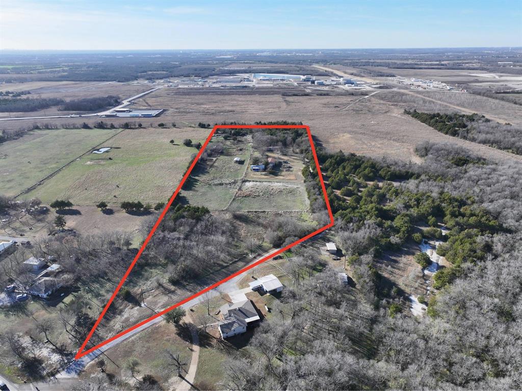 12.51 Acres in Unincorporated Collin County -- Now Priced at $875,000

This 12.51-acre tract in the ETJ of one of the fastest-growing counties in the United States represents a compelling entry point for developers, investors, ranchers, or long-term land holders. Unplatted and unrestricted by city zoning, the property sits close to US-380 and the McKinney growth corridor, where land values have tracked the region's consistent northward expansion.

County road frontage on Broken Arrow Lane provides easy access. City water is available on site. The land features a natural mix of mature trees and open pasture. Adjacent to Collin County's Sister Grove Regional Water Resource Recovery Facility -- a major public infrastructure investment that reflects the county's long-term commitment to this corridor.

Proposed uses include: residential subdivision, estate lots, barndominium, agricultural, ranch, commercial, recreational, or long-term hold. No HOA. McKinney ISD.

Seller is motivated. Priced at $69,944 per acre. Cash or conventional financing. Buyer establishing qualifying agricultural use may apply for an AG exemption through Collin County CAD -- no rollback tax risk since the property has never held an exemption. Buyer to verify zoning, utilities, AG exemption eligibility, and development feasibility.