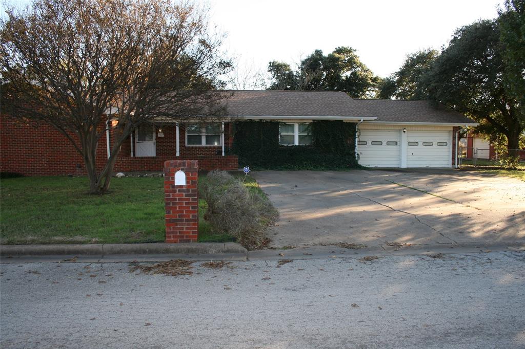 This property has three lots that are all fenced together. There is a storage shed and a workshop with carports on both sides. This has a two car garage, but one side has been converted into an office. The office could be returned into a garage easy. The three lots add up to .781 acres. The large yard gives you plenty of options for future use. You are less than a minute off of Hwy 180, close to restaurants and stores, just a few minutes to the library, and close to schools. There are two living areas that both have an outside entrance. One of the living areas could be used for a game room, large dining room, office, or even a piano lesson room which it is used for now. The large drive way also gives you some additional options. The outside covered patio gives you a place to entertain.