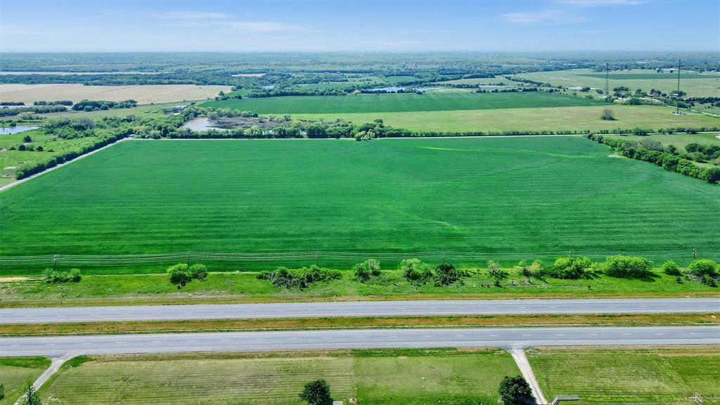 This property has everything you are looking for whether you want acreage for your new ranch or a property to develop for commercial uses.  This property has road frontage on 3 sides!!!  US Hwy 82 across the front, Nolan Rd to the east and Crow Rd to the South.  The property has access to Grayson Collin Electric and Two Way Water.  The City of Whitesboro also has services near by.  Properties like this one do not come along very often. So much potential!