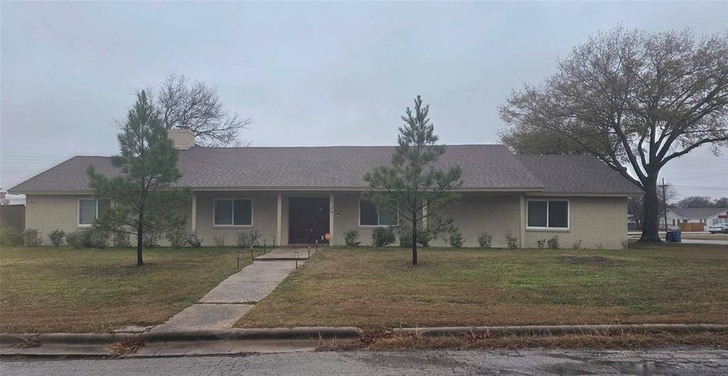 GREAT MEXIA HOME ON CORNER LOT!! This brick home has 3 bedrooms, 2 baths and a spacious 3 car garage. But wait till you see the Living Spaces! (pictures coming next week) The home has has been remodeled inside and out with new flooring, windows, trim and paint, and backyard privacy fencing. The sunken Living Room is extremely spacious with room for entertaining large families and friends. Imaging having all your family in one room to celebrate holidays around a cozy wood burning fireplace! Behind the Living Room is an additional entertaining space - the current Owner has a large pool table - you could use it as another sitting room or playroom for your kids. All bedrooms are a good size with ample closet space. The Dining Room is just off the Kitchen where you will find an abundance of refinished cabinets, a Kitchen breakfast bar and great countertop space. Outside is a grilling porch and great yard space. This home is conveniently located to all of Mexia's schools, dining and shopping. Call today for your Showing!!