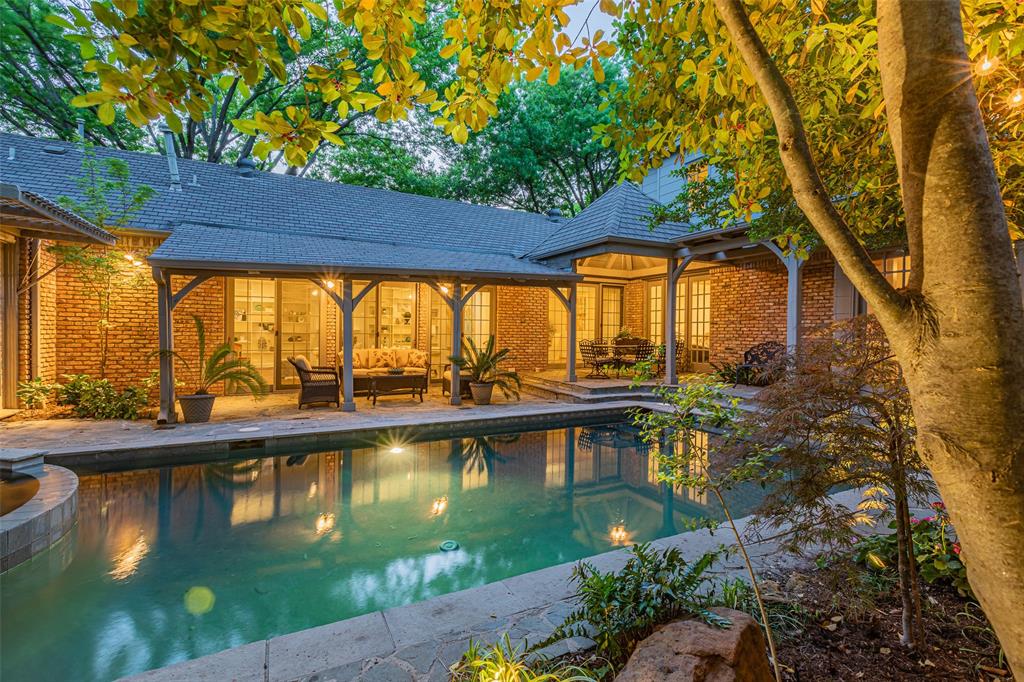 HPISD home, Versatile Light & Bright UPDATED 5.4.3.  Entertain in 23X16 Living featuring Fireplace, Wet Bar, Wall of Doors to Large Covered Patio, Pool, Fountain. Serve from Chef’s Kitchen featuring Top Notch Appliances, Excellent Storage & Quartzite Counters.  Dining of Dreams in Formal, Casual, Breakfast Bar & Patio. Cozy Up in Intimate Family with Corner Fireplace Opening to Kitchen & Patios.  Feel Luxurious in Level 1 Primary Opening to Patio & Pool & Dreamy White Bathroom.  Rest Well in 3 Additional Level 1 Bdrms. 1 Perfect Library or Office.  Breezy Laundry in Well-Appointed Utility 16X8 Dream Bonus with Skylights Opening to 2nd Courtyard.  Intriguing Stairway Window Leads to 2nd Level 13X11 Den, Kitchenette, 2 Bdrms., Bath & Balcony View of Pool.  2 Car Garage with Extra Parking.  All measurements & information to be verified by Buyers or Buyer's Agent. SD, Survey: T47, Plan, Amenities in MLS docs.