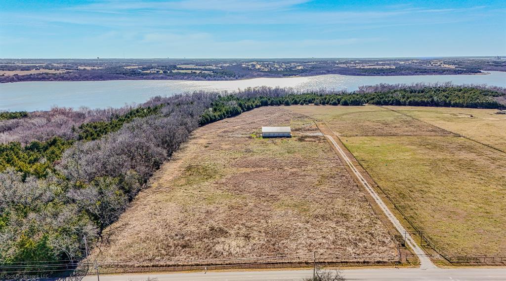 Beautiful 10± acre pasture tract in Farmersville offering the perfect blend of privacy, function, and country living. Bring your horses, build your dream home, garden, entertain, or create your own peaceful retreat with room to live, work, and play. The property includes a barn with apartment, plus existing septic, water, and electricity, adding immediate flexibility for weekend stays, guest quarters, storage, or use during construction.
Backing directly to U.S. Army Corps of Engineers land near Lake Lavon, this rare setting provides exceptional privacy with no neighbors behind you. Partially fenced with durable metal pipe fencing and already gated, the land is well-suited for livestock, hobbies, recreation, or long-term investment.
Enjoy quiet mornings, wide-open views, Texas sunsets, and evenings gathered around the fire pit—all just minutes from Farmersville, Lavon, Lake Lavon, and Highway 380. Deed restrictions apply. No mobile homes allowed. Property will not be subdivided.
