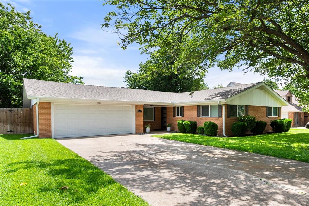 Move-in ready and meticulously maintained, this charming Fort Worth home offers the perfect combination of comfort, functionality, and convenience. Nestled in an established neighborhood with mature shade trees, you'll enjoy quick access to major highways, shopping, dining, and everyday amenities while still feeling right at home.

Inside, you'll discover inviting living spaces filled with natural light and designed for both everyday living and effortless entertaining. The spacious kitchen is truly the heart of the home, featuring stainless steel appliances, a large center island, abundant cabinetry, generous counter space, and an impressive walk-in pantry complete with built-in shelving and spice storage. Whether you're preparing weeknight dinners or hosting family gatherings, there's plenty of room to gather and connect.

A bright sunroom offers the perfect flex space for morning coffee, a home office, hobby room, playroom, or relaxing retreat overlooking the backyard. Storage is exceptional throughout the home, with large closets, an oversized utility and mud room featuring built-in cabinetry, dedicated freezer space, a drip-dry area, and an additional outdoor storage building—giving everything a place.

The oversized garage includes a built-in workbench for projects and extra storage, while the extra-long driveway provides ample parking for family and guests. Accessibility has been thoughtfully considered with handicap-friendly features and minimal ramping throughout the property.

Outside, the low-maintenance yard showcases lush St. Augustine grass and towering shade trees.

Energy-efficient features help provide year-round comfort and savings, including energy-efficient windows, a high-efficiency furnace and heat pump, programmable thermostat, LED lighting, and ceiling fans throughout.

Offering abundant storage, thoughtful accessibility, energy efficiency, and a location that's hard to beat, this well-cared-for home is ready for its next chapter.