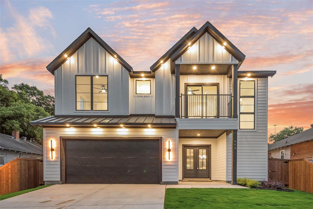 Beautiful new construction by Guel Family Builders, Inc., featuring 4 bedrooms, 3.5 bathrooms, and thoughtfully crafted living spaces designed for both comfort and style. The open-concept kitchen showcases a large island ideal for entertaining and flows seamlessly into the spacious main living area. The private downstairs primary suite offers a relaxing retreat with an en-suite bath complete with dual sinks, a soaking tub, a separate shower, and an oversized walk-in closet. Adding warmth and timeless elegance, real nail-down hardwood flooring extends throughout the home. Upstairs, a versatile loft and built-in hallway desk provide the perfect space for work or study. The secondary bedrooms feature a functional Jack-and-Jill design, with each bedroom offering its own private vanity area and walk-in closet for added convenience and privacy. In addition, there is a separate upstairs bedroom with its own walk-in closet and direct access to a full bathroom, which is also accessible from the hallway. Conveniently located within walking distance to the new Halperin Park and just minutes from the vibrant Bishop Arts District, this home also offers quick access to major highways, schools, shopping, and dining for added everyday convenience. Blending modern design with practical features and a prime location, this home is perfect for everyday living and entertaining
