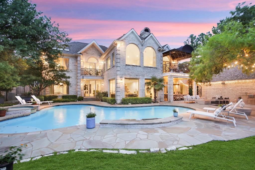 Steeped in unrivaled privacy and serenity, this stunning Colleyville home with CASITA flaunts dramatic views and luxurious finishes. Beautiful lakefront setting will make you feel like you’re on vacation every day. Poised on a sprawling 2.6-acre parcel, this oasis boasts upscale features including designer accents, massive windows, smooth walls, wine room, and 5” white oak floors. The culinary epicenter of this home boasts a chef’s kitchen adorned with top-tier appliances and dual expansive islands. A peaceful retreat unfolds in the primary suite presenting lake views, a vaulted ceiling, a spa-like bath with a soaking tub and dual vanities, private sitting room and balcony. With 5 generously appointed bedrooms and remodeled bathrooms, luxury and comfort abound. A detached casita awaits with its own kitchenette and awe-inspiring views. This premier location in the sought after Colleyville school district is close to Dallas, Ft. Worth and DFW Airport - seize the opportunity today!