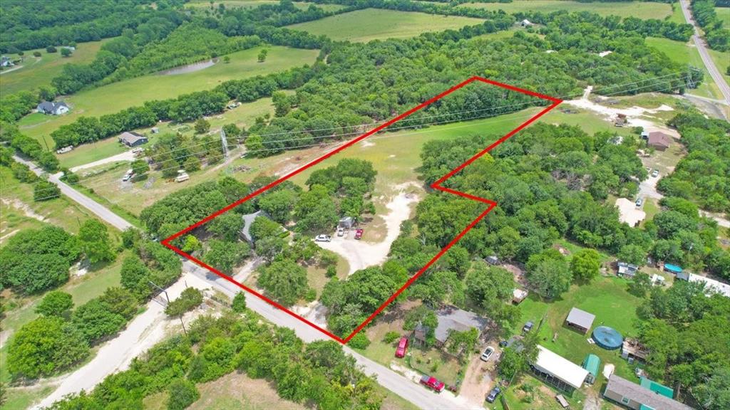 Welcome to your own slice of country paradise in the Tom Bean ISD! Nestled on 4 beautiful acres, this charming 3-bedroom, 1-bath home is full of character and endless potential. A circular driveway welcomes you home, while the spacious shop provides the perfect place for hobbies, projects, storage, or equipment. Whether you're dreaming of a large garden, a small farm, or a place for your animals to roam, this property offers the space and flexibility to make it happen. Enjoy peaceful country living with room to grow, create, and customize to your heart's content. If you've been searching for acreage, functionality, and opportunity all in one property, this is the one you've been waiting for!