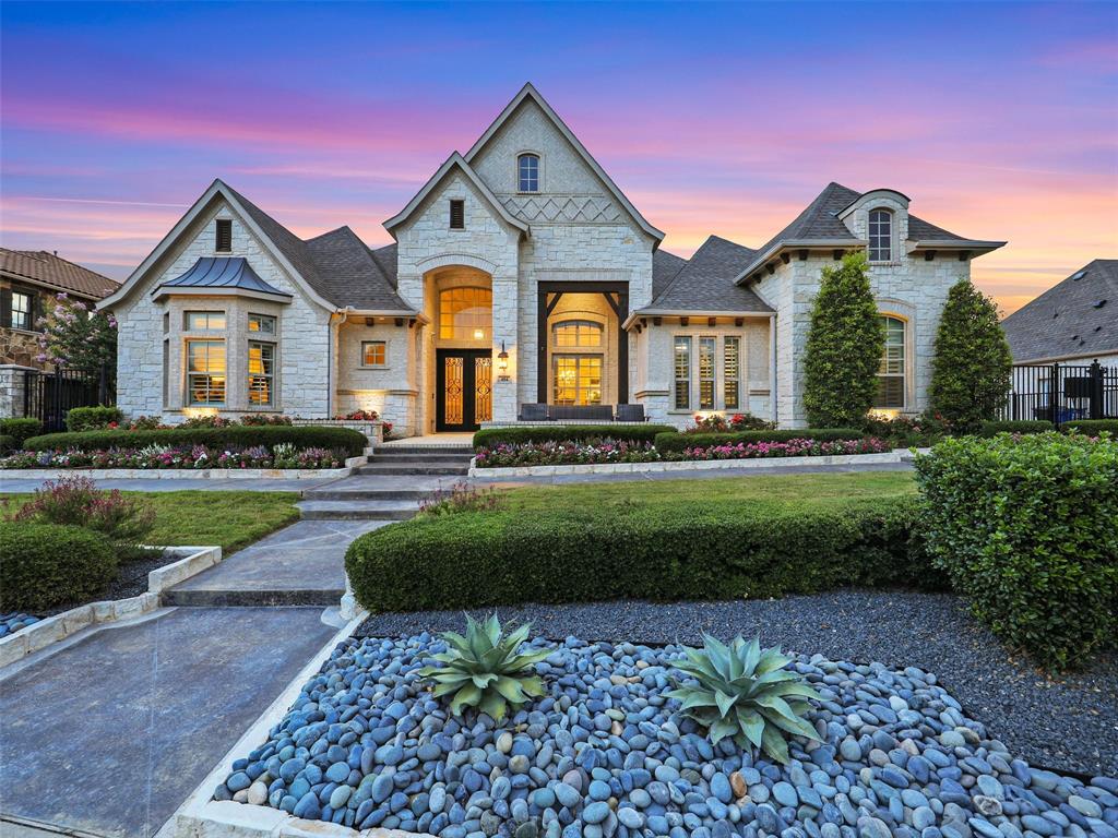 Discover luxury living in this former model, single-story home with captivating pond views. This elegant residence offers 4 bedrooms, each with ensuite baths, plus 2 convenient half baths. The outdoor oasis features a sparkling pool and spa with travertine decking and a fire pit for cozy gatherings. Enjoy outdoor entertaining in the living area with a built-in grill. Inside, the kitchen is a chef's dream with marble countertops and Wolfe appliances. The home features Lutron lighting, all-new flooring, and has been freshly painted, ensuring a modern and inviting atmosphere. A spacious 4-car garage provides ample storage.  This home is in the heart of Southlake.  You will love walking to the grocery store, movies, dinner and Southlake Town Square.   Located in the highly regarded Carroll ISD, this home epitomizes luxury and comfort.