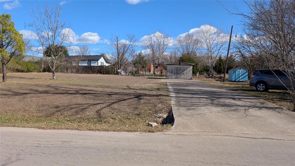 NO HOA!  Close to I-30 and the lake. City water and sewer is available, no septic needed.  Rockwall schools, abundant shopping and dinning close by.  Perfect lot to build on (city of Rockwall restricts mobile homes), already has concrete culvert and drive plus a storage shed.