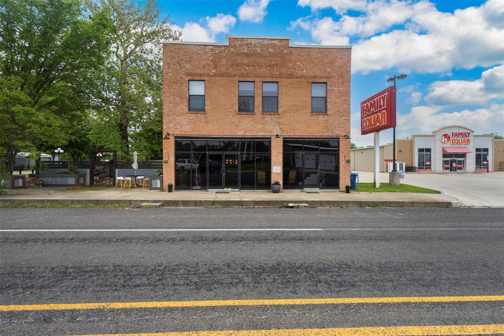 Motivated Seller: 
Historic small-town charm meets artistic city loft in this beautifully renovated building. Uniquely designed to retain historic attributes while incorporating modern touches there isn't another property like it. It boasts the potential for enough room to add additional bedrooms, playrooms, and other living spaces, perfect for a growing family. Handcrafted wood and metalwork provide a warm and stylish environment. Venture into the backyard oasis, a tranquil retreat offering privacy and boundless potential. Bring your ideas to this ready-to-live-in property and make it your own.
