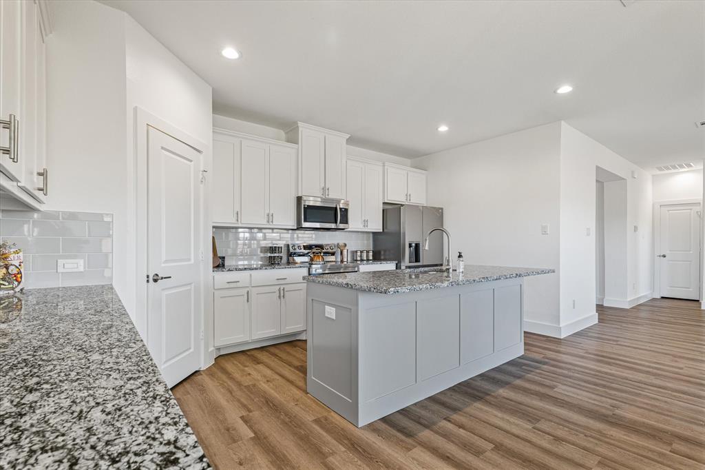BUILDER INVENTORY CLEARANCE!! REFRIGERATOR, WASHER, DRYER INCLUDED! Check out this Stunning New Construction Home located in family-friendly neighborhood! This Spacious 1.5 story home has 3BR, 2.5Baths, & BONUS ROOM. The floor plan ensures that you will be greeted by an inviting foyer that leads to open concept living area designed to maximize space & natural light. The main level features Large Windows, HIGH CEILINGS, & impeccable finishes! The kitchen features beautiful cabinetry, Stainless Steel APPLIANCES, & spacious island. Master suite is a serene retreat with an en-suite bath & walk-in closet. This home embodies the essence of country living with its peaceful surroundings, but it's also conveniently located near schools, shopping,& entertainment options. Approx 1 hour from DFW and 30 Min from Winstar Casino!! The lot is landscaped & fully sodded with irrigation. Home has limited lifetime architectural shingles& spray foam insulation. Muenster ISD is an Award Winning ISD