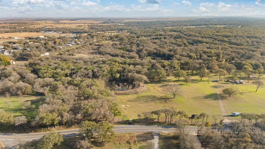 Welcome to 223 W Gaithings in Covington,  a beautiful 6-acre tract offering the ideal balance of seclusion, natural beauty, and small-town convenience. This rare find features a mix of mature hardwoods, rolling terrain, and open pasture, giving you endless possibilities for building your dream home, recreation, or investment.
Tucked just off the road, this property provides a peaceful setting with scenic views, towering oaks, and a small pond area that adds charm and potential for wildlife enthusiasts. A generous portion of the acreage is wooded, offering shade, privacy, and multiple build site options, while the open areas create the perfect setting for a homesite, barn, workshop, or livestock.
Whether you're dreaming of a custom home tucked under the trees, a family retreat, or a place to bring your animals—this land is ready to become whatever you envision. Possible Owner financing available!