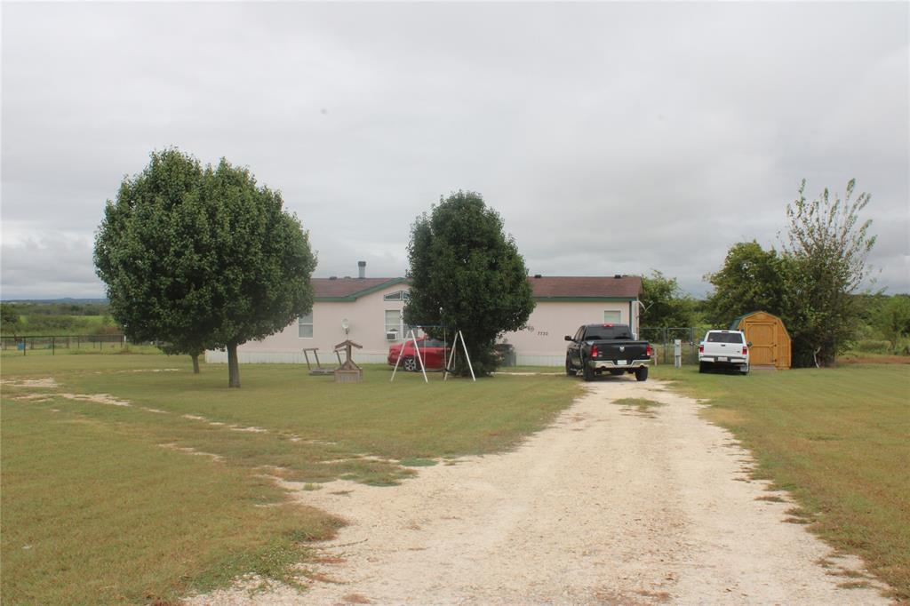 Nestled on 2 peaceful acres in the charming community of Godley, this inviting 3-bedroom, 2-bath mobile home offers the perfect blend of comfort, space, and tranquility. Surrounded by a well-established neighborhood known for its friendly, welcoming neighbors, this property provides a true sense of home from the moment you arrive.

Step outside and enjoy the wide-open space, where gentle breezes and quiet country views create a relaxing retreat from the hustle and bustle of city life. The partially fenced land offers both privacy and flexibility, perfect for pets, gardening, or simply enjoying the outdoors.

Inside, the home offers a solid layout with great potential, ready for your personal touch. It does need a little TLC, making it a wonderful opportunity to customize and truly make it your own. The property is being sold as-is, offering excellent value for buyers looking to invest in a peaceful country setting.

Whether you're sipping your morning coffee under the open sky or unwinding in the quiet evenings, this property is a rare chance to embrace a slower, more serene lifestyle while still being conveniently close to town amenities.

A place where comfort meets calm, this is more than just a home, it's your own private slice of Texas countryside.