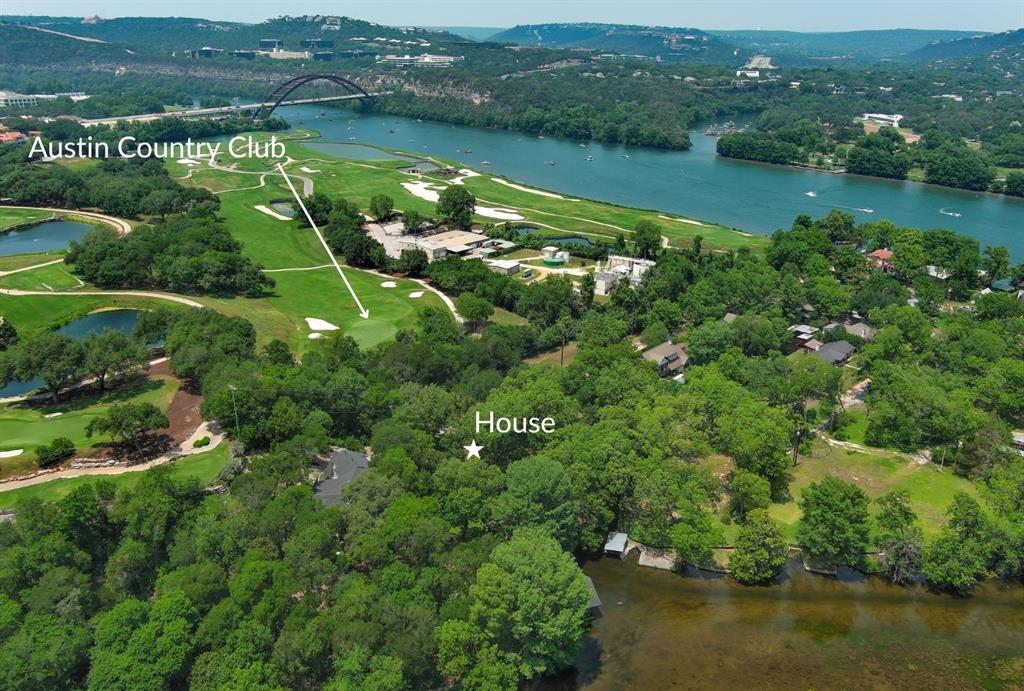 Rare Waterfront Opportunity Near Austin Country Club with Boat Dock Permit - Additional Lot With Second Boat Dock Permit Also Available A truly rare opportunity awaits in one of Austin’s most coveted neighborhoods, zoned to Eanes ISD. Situated on a private cul-de-sac adjacent to the prestigious Austin Country Club, this unique waterfront property totals .395 acres and is permitted for a one-slip boat dock. An additional lot also permitted for a one-slip boat dock is also available, for a total of .77 acres. Backed by the peaceful pond of Windy Cove and offering direct water access from inlet lake to Lake Austin via channel, this property combines privacy, convenience, and potential. Towering, mature trees of varying species provide a natural canopy, while layered foliage enhances the sense of privacy. The existing one-story residence spans approximately 2,250 square feet. The home features 3 bedrooms and 2 bathrooms and has the potential to produce income as a short-term rental. Whether you choose to update the current home or bring your own vision with a custom build, the setting is ideal for creating a serene lakeside retreat. Opportunities like this—offering size, privacy, a permitted boat dock and income potential on Lake Austin—are exceedingly rare. Additional lot with permitted one-slip boat dock also available, see Agent for more information. Seller is a licensed Real Estate Broker in the state of Texas