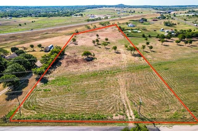 Nestled on 5+ acres, this remarkable property offers the freedom to create your own oasis. Situated at the coveted intersection of FM 1902 and County Road 1016, just a stone's throw away from the Chisholm Trail tollway.  This location offers the perfect balance between privacy and accessibility, ensuring that you can enjoy a serene country lifestyle while still being within easy reach of schools, shopping centers, dining options, and entertainment venues. Entrance is off CR 1016 (see photo). This property is adjacent to 8504 FM 1902 which has 5 acres and is also listed for sale.  Let your dreams unfold, as this property comes without any deed restrictions. If you want to have it rezoned, the City of Burleson has a list of land uses I am happy to share.