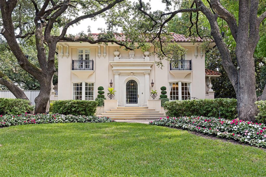 Located on prestigious Beverly Drive in Highland Park, this exceptional home showcases timeless elegance and extraordinary craftsmanship. 
The home offers a stately presence with manicured grounds, mature trees and classic architectural symmetry.
The exterior entry includes a stone surround of Lueders limestone with engaged columns, leaded glass door, designed by architect Rick Robertson.
The interiors are defined by quarter-sawn oak floors, special finishes, and exquisite millwork, four wood burning fireplaces. Dining room includes chandelier with baccarat crystals. The chef’s kitchen is equipped with top-tier appliances, custom cabinetry, large pantry and silver closet, floors of imported stone with black cabochon. The breakfast room includes a smokeless Count Rumford design fireplace, two walls of leaded glass windows, view of swimming pool and Pergola, floors of imported stone with black cabochon; large painted wood paneled family room, with four sets of French doors,  floors of quarter sawn oak in herring-bone pattern, with smokeless Count Rumford wood burning fireplace.  A temperature-controlled wine cellar storage of 25 cases, with stone stairs, stone floor, and antique oak armoire. Upstairs, the serene primary suite features dual closets and a luxurious marble bath, while additional bedrooms offer balconies and generous proportions. Upstairs library with elegant flitch-matched quarter sawn oak  custom paneling, and coved plaster ceiling. Bookshelves with storage below. Wood burning fireplace with antique marble mantle, quarter sawn oak floor in herring-bone pattern. Outdoor living is equally impressive with a heated pool, fountains, and a raised pergola, creating a private retreat. Complete with guest quarters and a three-car garage, this is a rare offering of quality, character, and timeless design.