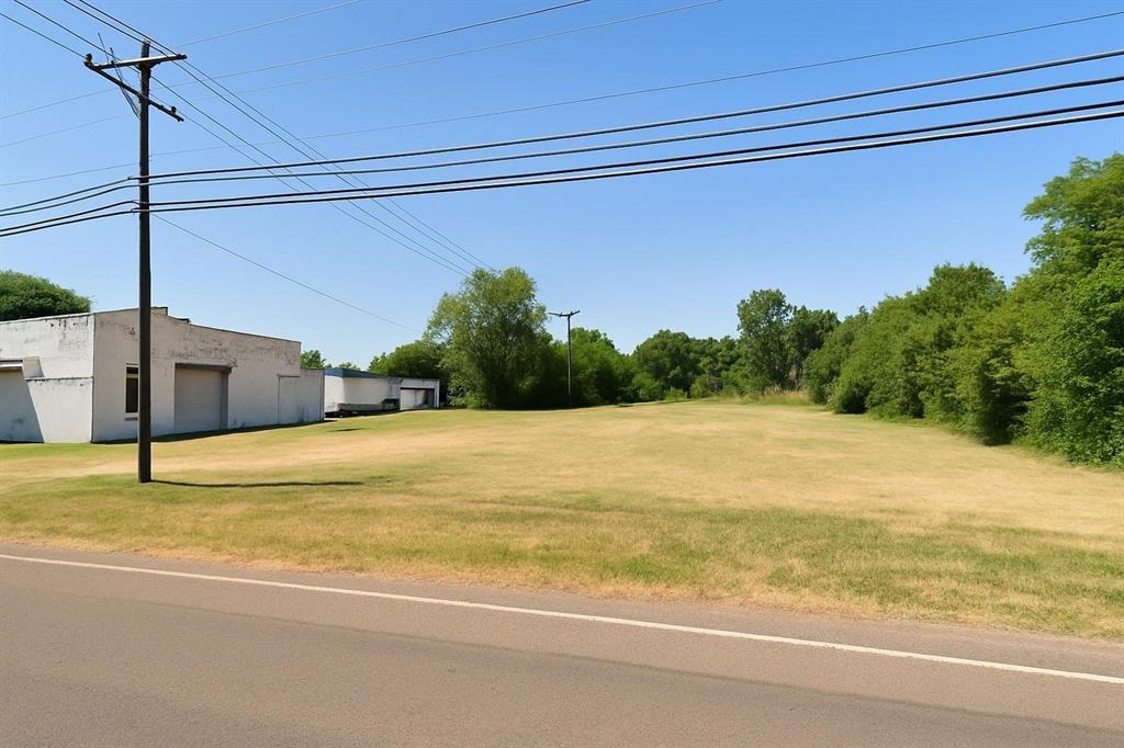 Prime 1.39-Acre Development Opportunity on Main Street! Located just minutes from the historic downtown district of Sulphur Springs, this unimproved 1.39-acre lot offers excellent potential for residential or multifamily development. The property features generous Main Street frontage, level topography, and convenient access to major roads, shopping, restaurants, schools, and parks.
City utilities including sewer, water, and electricity are available at the street, eliminating the need for well or septic and helping streamline the development process. Current zoning allows for residential and potential multifamily uses, making this an attractive option for builders and investors exploring opportunities such as single-family homes, duplexes, townhomes, or small multifamily projects (buyer to verify all zoning and development requirements with the city).
Surrounded by established homes and nearby businesses, this property offers location, visibility, and flexibility for a variety of development strategies including spec builds, rental housing, or a hold-and-develop investment.
Rare opportunity to secure 1.39 acres within city limits with utilities available in a growing area near downtown.