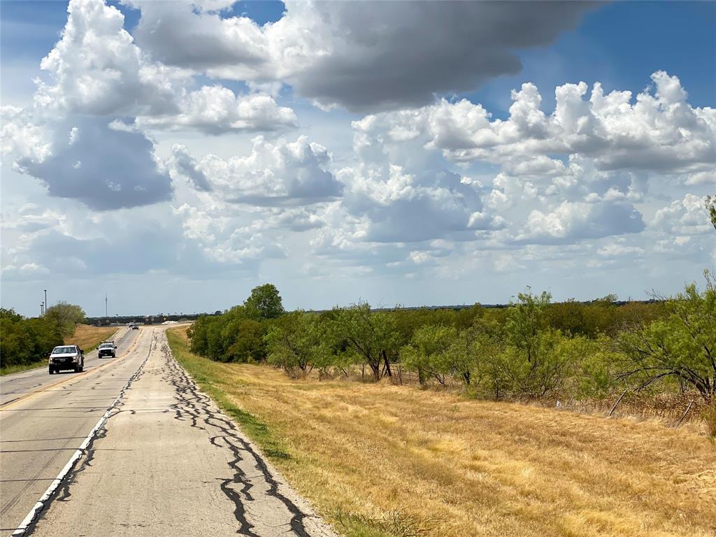 Prime Highway Frontage at the Corner of Hwy 77 and Hwy 81 near the I35 split to Dallas and Fort Worth! Commercial and Industrial Development is Underway in the area! Less than a mile to the East is the Newly Announced Location for Bucee's Gas Station-Travel Center & Amigo's Travel Center is being constructed nearby also.  To the South is an Industrial Park that includes SF Manville and Gate Precast, just to name a few. There's a 16 inch water line Installed with Fire Hydrants Installed every 500 Feet! So Much Opportunity with this 105 Acres!