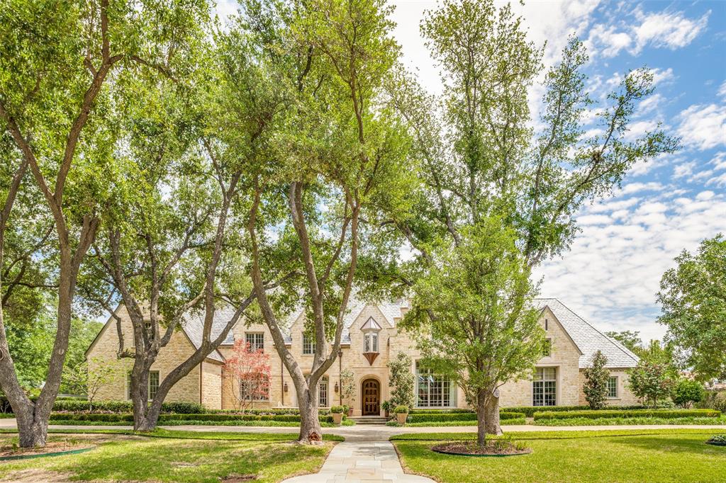 Timeless elegance of this iconic Gage Custom Home is 10332 Woodford Drive.  Situated on over an acre of impeccable landscaping frames the structure of this estate.  The uniqueness of the home exudes elegance and comfort.   Family living is enhanced by three indoor fireplaces and one outdoor fireplace, Sport Court that includes a Pickleball Court and a Putting Green.  The home features a primary suite and spacious guest room downstairs, a Library, Conservatory Sunroom, four living areas, two laundry rooms, a kitchen with all of today's highly valued amenities, a wet bar with dual dishwashers, dual wine refrigerator and another ice maker.  The home is designed to overlook the beautiful backyard grounds and salt water pool.  The upstairs has a large living area complete with a refrigerator, sink, ice maker and an exceptional game room and 3 bedrooms with entuite baths.  This classically designed home is one that will provide years of enjoyment and pride of ownership.