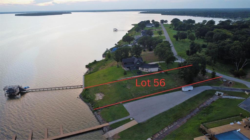 Exceptional waterfront lot in a prestigious gated community! This prime property offers direct access to upscale amenities including an infinity-edge pool, fitness center, serene pond, and a community dock. Located just steps from the GOLF COURSE, it’s the perfect setting for those who value both luxury and leisure. Conveniently situated just off Highway 175, you’ll enjoy a quick and easy commute to Dallas. Don’t miss this rare opportunity to build your dream home in an unbeatable location!