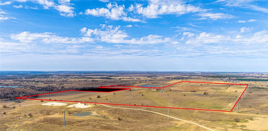 Welcome to your very own country escape 30 minutes south of Fort Worth, in the heart of Johnson County.  This meticulously cared for home, situated on top of 138 acres, is in the much desirable Godley ISD.  With a bright and open floor plan, this inviting home was built for entertaining!  Enjoy the breeze from either the front or back covered porches, watching the sun rise & set!
Ranchers or Developers this is the one you’ve been waiting for. With 138 acres of rolling hills, the opportunities for investment are as wide as this property’s Texas sized views.  Set up an appointment with the Listing Agent to see this gem in the rough- PLEASE NOTE: Proof of Funds required along with an 8 hour notice: Patti Burkhart 817-240-7322 
Adjoining and enhancing this property is 75 acres that totals a little over 210 acres to grow your profits. MLS#  20003259