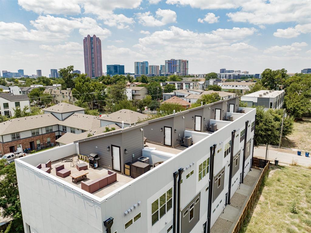 Discover a luxurious enclave near downtown Dallas, where five exclusive townhomes redefine urban living. Each meticulously crafted unit features two spacious bedrooms, 2 full and 1 half baths and tall ceilings that create an atmosphere of openness and elegance. Premium finishes throughout showcase meticulous attention in detail, complemented by abundant natural lighting that fills every corner. With convenience in mind, each townhome boasts a private 2-car garage, providing both added security and ease of access. As the crowning jewel, expansive rooftop decks offer panoramic vistas of the iconic Dallas skyline, perfect for entertaining or simply unwinding against the backdrop of city lights. Experience the pinnacle of urban sophistication at these bespoke townhomes, where every detail is designed for the discerning resident seeking unparalleled comfort and style near downtown Dallas.