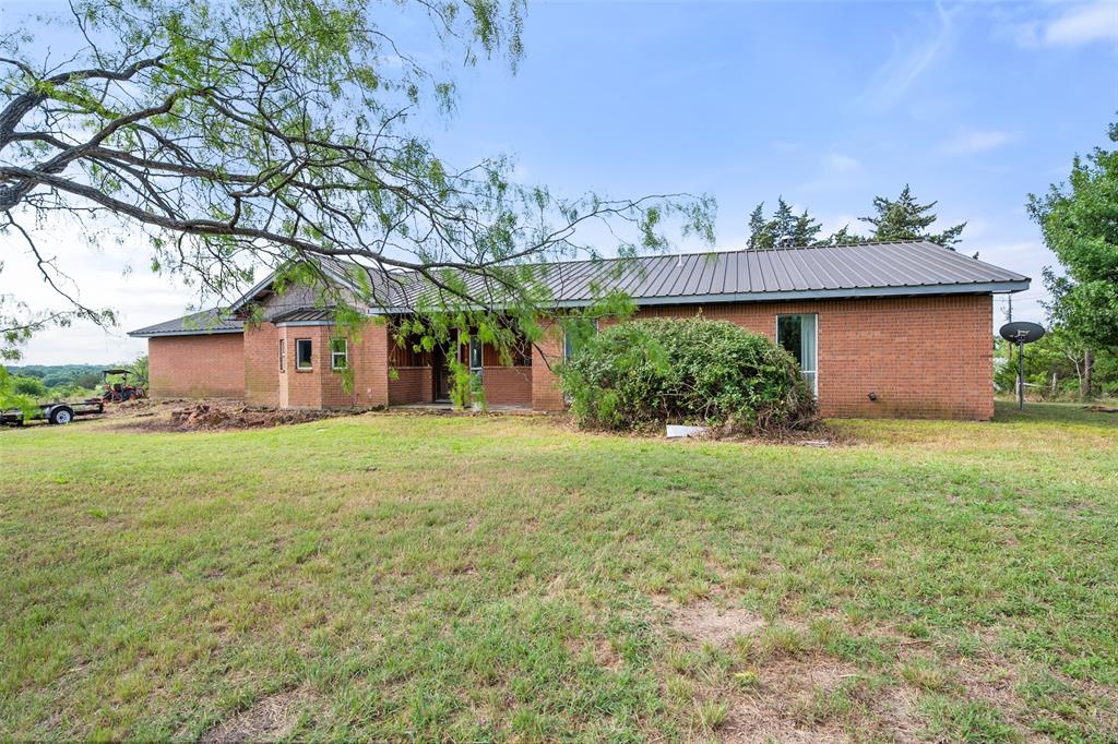 Nestled on the scenic west end of Navarro County, 9326 NW County Road 1343 offers a rare escape from the concrete jungle. Boasting solid brick construction and a durable metal roof on more than 9 sprawling acres, this 3-bedroom, 2-bathroom home is a blank canvas waiting for your final personal touches. Whether you've dreamed of watching your livestock roam across cross-fenced pastures, spending afternoons by your own private pond and creek, or just enjoying a midnight sky where the stars actually shine brightly, this property delivers. Bring your vision, execute those last few details, and watch your sweat equity turn into positive returns. Your ideal country retreat awaits.