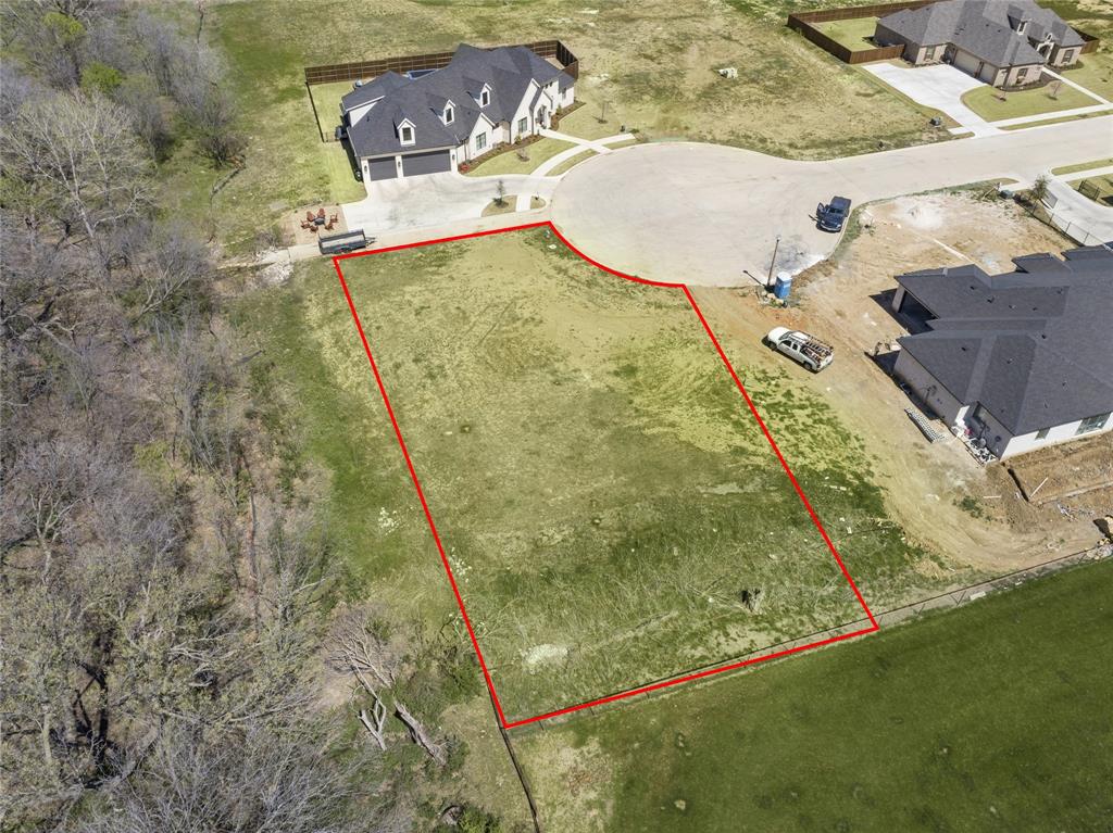 Discover this exceptional 0.4160-acre cul-de-sac lot in one of Denton's most highly coveted neighborhoods with no HOA. Priced at $265,000, this blank canvas offers the freedom to bring your dream home to life with the builder of your choice. The generous lot size provides ample space for your ideal home design, outdoor living areas, and landscaping vision. Enjoy the distinctive advantages of a corner location with enhanced curb appeal. This desirable property boasts close proximity to excellent Denton public schools and the private Denton Country Club, combining convenient access to quality education and recreation with the charm of an established community. Don't miss this rare opportunity to build your custom home in a prime Denton location.