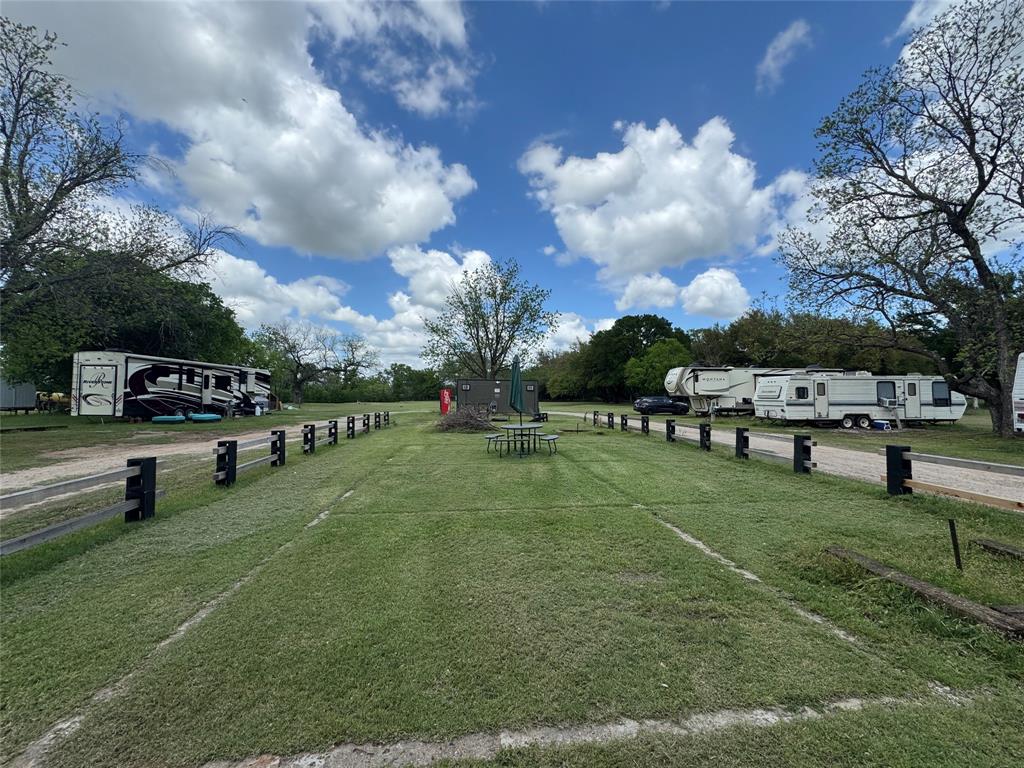 Unique 98+ acre investment opportunity with MULTIPLE income streams and endless possibilities! Rare chance to own a multi-property portfolio featuring a 62- acre golf course, 15+ acre RV park with a Horse Arena, and a 21 acre piece of property with room to expand, all with strong rental income potential and room to expand! 

The centerpiece of the property is golf course property which includes a clubhouse with a bar- tavern, pro shop, two office spaces, a large pool (not currently in use) and lounge area, a formally used restaurant space that could easily be used to create a dancefloor to expand for a nightclub, or even a perfect wedding venue for someone with the right vision. Plus 12 working golf carts that can be used for additional rental income, a second pool and community center located near the back of the golf course that is waiting for a full renovation, and with 21 additional acres of greenbelt land, there is excellent potential for expansion into an RV resort, event venue, or entertainment destination. 

The 15+acre RV park offers 10 rental spaces with utilites, Wifi, recreation area, and additional income from storage containers and a large multi-use metal building. Not to mention with the arena in place you can be a host to many events, and rent out the facility for an added stream of income. 

With potential like this, the possibilites are endless!
