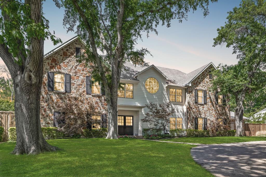 Located in the heart of the prestigious private school corridor, this stunning home offers space, style, and convenience on a beautifully landscaped lot shaded by mature trees. The open-concept floor plan features multiple living and dining areas, ideal for both relaxed family living and elegant entertaining. The expansive kitchen is a true centerpiece, complete with a large island, breakfast bar, walk-in pantry, and ample storage—perfect for any home chef. The spacious primary suite is conveniently located on the main level, while three generously sized bedrooms are upstairs. A 3-car garage plus covered parking for an additional vehicle provides exceptional space for cars, hobbies, or guests. This home blends comfort and function in a prime Dallas location close to top-rated private schools, dining, and shopping. Don’t miss the opportunity to make this exceptional home your own!
