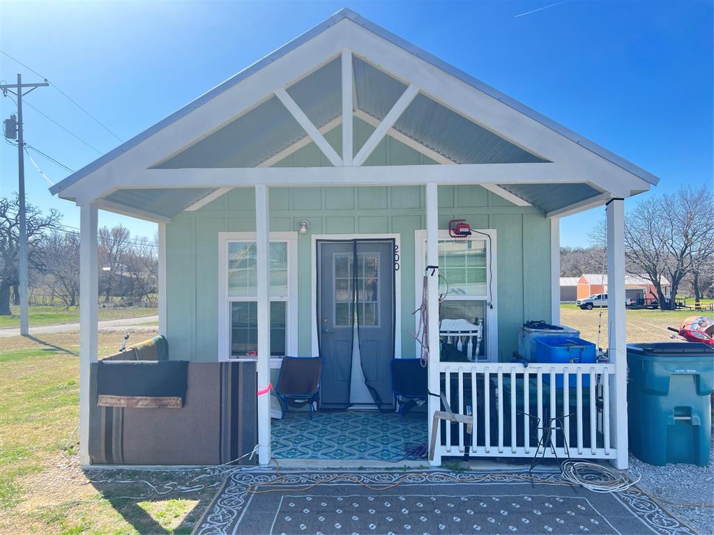 Images of interior may not be of the actual subject property. Discover the allure of urban living with this stylish tiny home located in a quiet neighborhood minutes away from HWY 287 for an easy commute to restaurants and boutiques. Thoughtfully designed to maximize space, this modern gem boasts an open concept layout. Unwind in the cozy living area or whip up gourmet meals in the efficient kitchen. Convenient location mixed with contemporary charm, this urban oasis is the perfect place to call home for those who crave seclusion with a touch of sophistication.
