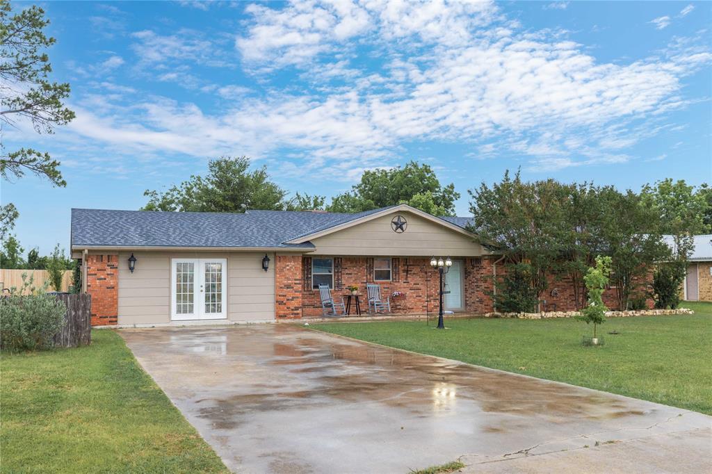Welcome to this beautifully updated 4-bedroom, 3-bath home situated on a spacious 0.5-acre lot in a highly desirable neighborhood! Offering the perfect blend of comfort, functionality, and outdoor charm, this property is truly move-in ready.

Since 2022, the home has undergone extensive upgrades, including a new roof, HVAC system, hardwood flooring, fresh interior paint, new carpet, updated fencing, and a stunning outdoor deck with pergola—perfect for relaxing or entertaining. The kitchen has also been refreshed with a new microwave and dishwasher, and all appliances convey, including an additional refrigerator in the shop and a stand-up freezer in the sunroom.

One of the standout features is the converted garage, now a fully functional living space complete with a full bathroom, two closets, and a kitchenette. This versatile area is ideal for a mother-in-law suite, private guest quarters, teen apartment, or even potential rental income.

Step outside to your own backyard oasis, designed with the gardening enthusiast in mind. Enjoy a greenhouse, rainwater collection system, vehicle access gate, and a variety of producing plants including pecan and pear trees, as well as thriving blackberry bushes.

The 1,200 sq. ft. shop provides ample space for storage, hobbies, or a workshop, adding even more value and flexibility to this incredible property. The shop is heated and cooled. 

With its prime location, thoughtful upgrades, and unique features, this home offers something for everyone. Don’t miss your chance to own this one-of-a-kind property!