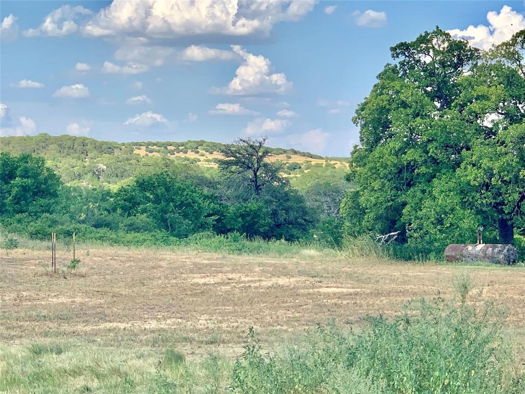 Get out to the countryside! No restrictions and outside of city limits. Enjoy a couple of historic Paluxy acres that have recently been cleared, ready for your farmhouse or barndominium! Large corner property offers many options. Scenic views towards the hills and fields of Paluxy. Minutes from Dinosaur Valley State Park, beautiful Paluxy River crossings, and quick drive to Granbury, Stephenville, Glen Rose, and Tolar! Tolar ISD for schools! This tract sits next to historic Paluxy General Store, and behind Paluxy Baptist Church. Current well on property estimated at 150' deep, pump condition unknown. Co-op electric available on site. Existing aerobic septic system on property believed to be in serviceable condition. Survey available!