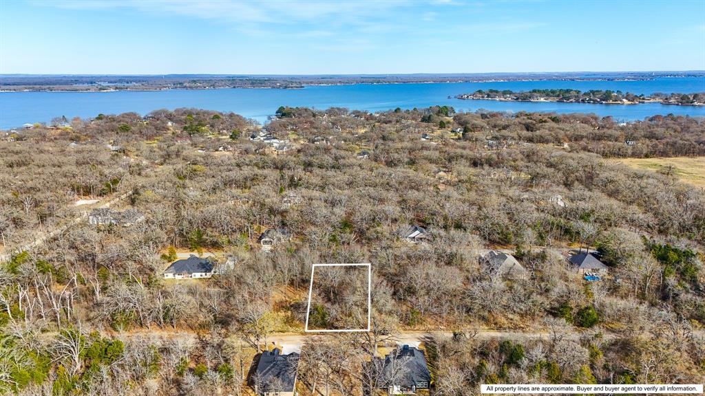 Lot 43 offers approximately .165 acres in one of Cedar Creek Lake’s most established communities. With mature trees throughout, this property provides a natural backdrop you simply can’t recreate.
Inside Beachwood Estates, residents enjoy access to a swimming pool, playground, pickleball and tennis courts, boat ramp, and fishing pier. It’s an easy choice for someone wanting to enjoy lake life without the premium waterfront pricing — and still have all the benefits that make summer unforgettable.
