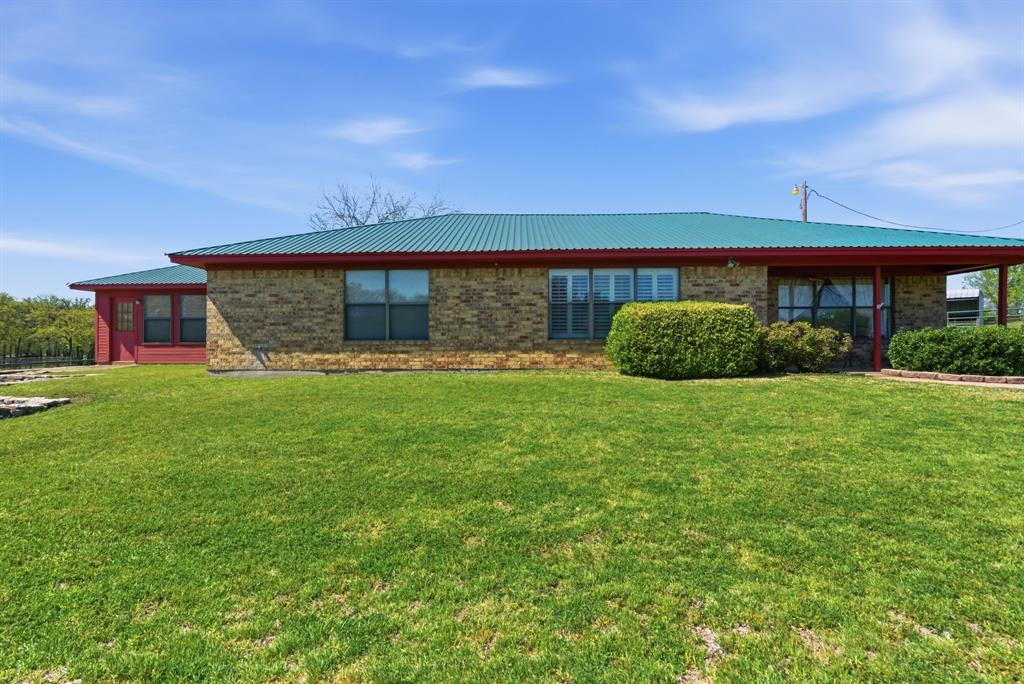 Immaculate equine facility and home in a great location, just four miles South of I20 and in the highly rated Brock ISD. Attention to detail is
evident throughout the property with animal safety the first priority. The tilt wall concrete main barn has eight stalls, two large foaling stalls, feed room and wash rack. The second barn has eight stalls plus an exam stock. The third barn has two stalls. There are nine paddocks
with improved coastal and fenced with pipe and mesh wire. A 50 ft. round pen and storage building plus an area for shavings storage.
The three bedroom, two bath well maintained home features an updated kitchen and master bath. Other amenities include a kitchen island,
granite counter tops, vaulted ceiling, wood burning fireplace, plantation shutters, and a utility room. The property is on a well, with a water
softener and filter system, nice covered back porch, handy outdoor patio area, and beautifully landscaped.   
This property is owned and has been operated by one of the most well known and respected horseman in the country.