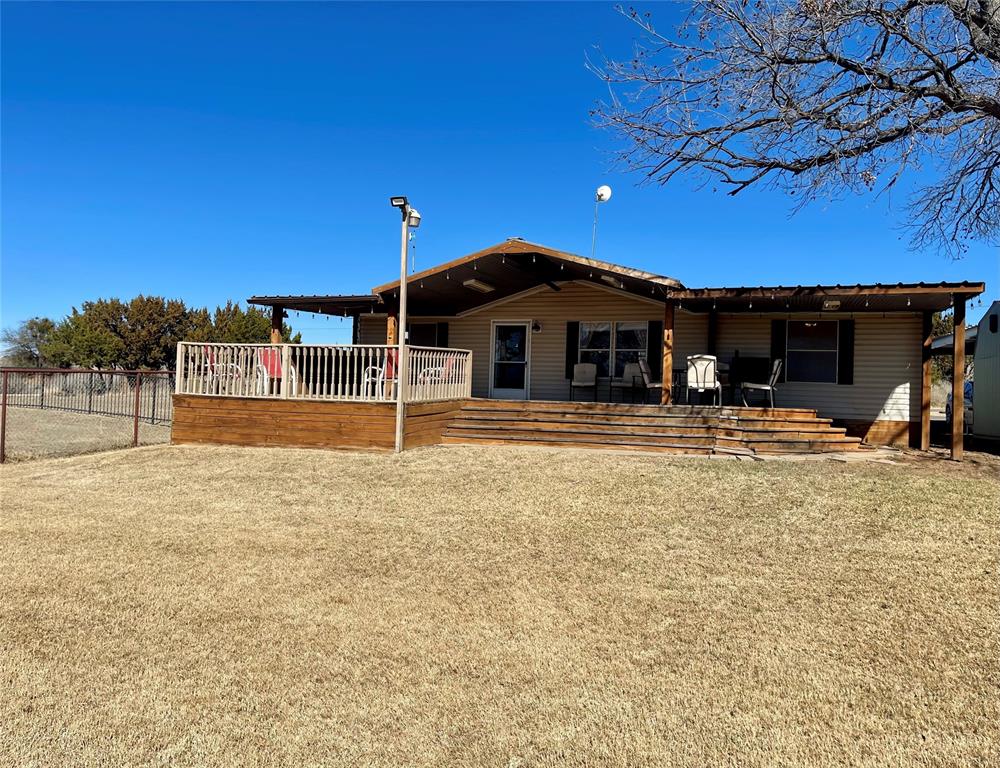 If you’ve been searching for a lake getaway with HUGE views and plenty of outdoor space, this is the one! This 3-bedroom, 2-bath home is tucked away at the end of the mailbox road in Golden Cove, offering a peaceful setting with minimal traffic—your most frequent visitors are likely to be invited guests or the friendly neighborhood deer and geese. The expansive covered lakeside deck is perfect for cookouts, gatherings, and relaxing with friends, while the uncovered section is ideal for soaking up the sunshine or enjoying an afternoon nap. Inside, the open living-dining-kitchen floor plan is designed for lake living and entertaining, with a breakfast bar and room to accommodate large groups. Two of the bedrooms capture those incredible lake views, bringing the outdoors in. The kitchen offers ample counter space and storage, includes a dishwasher, and connects conveniently to a separate laundry room. An exterior door near the parking area provides easy access to the outside storage building—perfect for lake gear. The spacious guest bedrooms easily accommodate guests, and the shared bathroom is generously sized. The primary bedroom features an en-suite bath, giving this cozy cabin a true “home away from home” feel-or the comfort you’d want for full-time living at Possum Kingdom. Bonus: This property is being offered fully furnished! Golden Cove is a one-of-a-kind community known for its built-in “lake family,” community activities, and excellent amenities including a swim cove, boat ramp, dock, pavilion, on-site mailbox area, and rentable cabins for overflow guests. Rentable storage units within the community make it easy to keep your boat and lake extras ready to go. This is leasehold land with a currently renewable two-year lease, paid monthly. Golden Cove is an affordable and welcoming place to begin your lake life - land taxes are paid by the landowner, you’ll be close to all the lake hot spots, and can enjoy some of the most amazing sunsets on Possum Kingdom Lake.