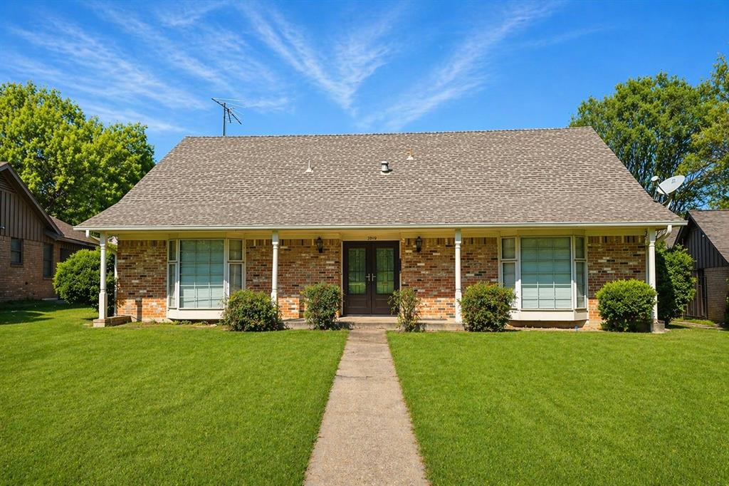Tucked into picturesque Oak Park Estates, this 1963 Oak Cliff classic blends timeless character with everyday livability—just a short stroll from beloved Kiest Park's rolling green spaces and mature trails. Meticulously maintained, the home offers generously scaled living areas, spacious bedrooms, three full baths, a dedicated home office, and the kind of abundant closet space rarely found in newer construction. The oversized laundry room features built-in cabinetry and an integrated utility sink—an everyday luxury. Outside, wide lots, tree-lined streets, and manicured lawns define one of Dallas's most enchanting neighborhoods. For buyers seeking serenity, character, and a genuine sense of place just minutes from downtown, this one belongs at the top of the short list.