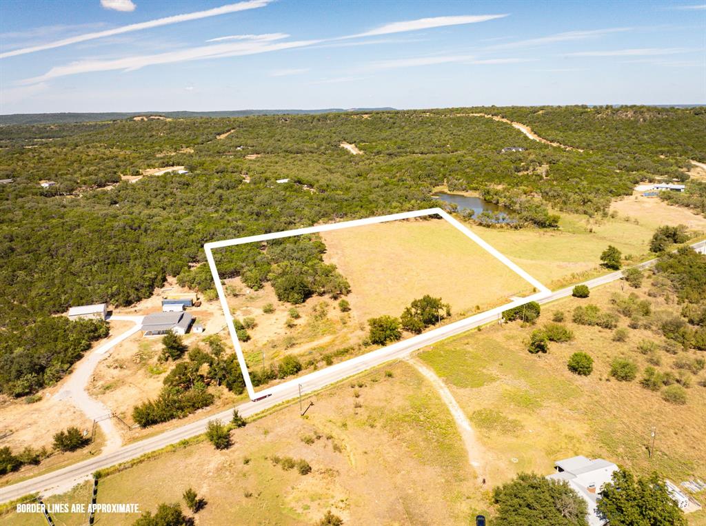 Stunning 5-acre property in the Brazos Mountain Ranch, a premier gated community. Build your own getaway cabin, barndominium, or simply enjoy your land as you see fit. You'll have access to the neighborhood's private river access and the 5-acre park. 45 minutes from Possum Kingdom Lake. Palo Pinto County New State Park featuring a visitor center, playscape, pavilion, equestrian, camping, fishing and more. The property has membership in a cattle grazing association is mandatory to ensure that the very important AG-Exemption remains for all.
