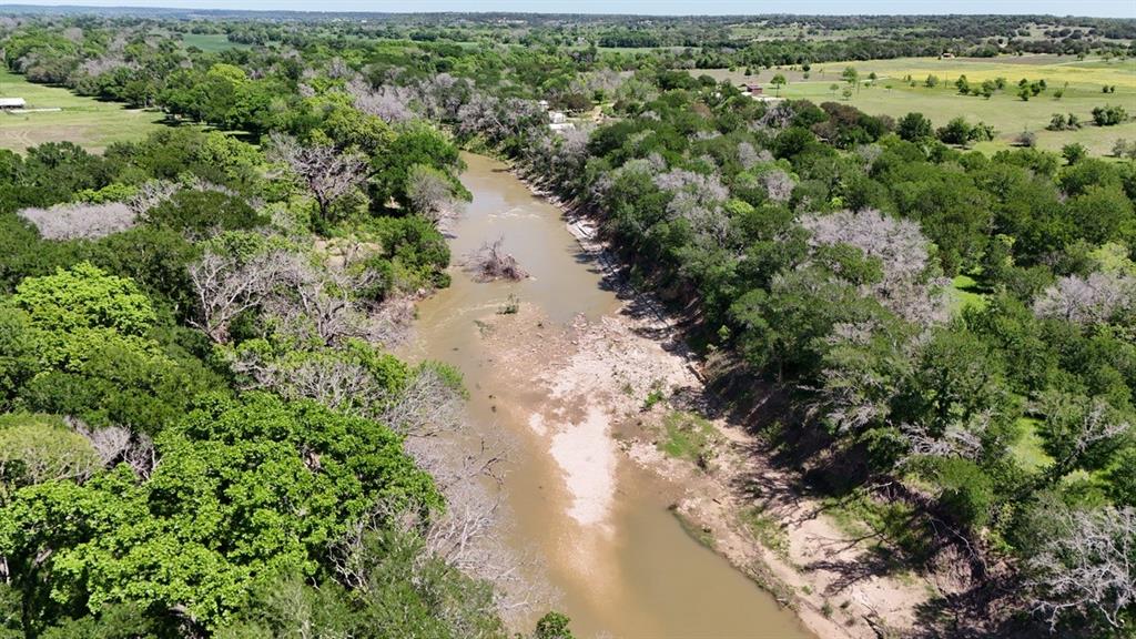 40-Acre Riverfront Ranch Opportunity – Bosque County, Texas 

Nestled along the pristine Bosque River just outside Valley Mills in Bosque County sits this rare 40-acre ranch property that checks every box for serious ranchers, farmers, and outdoor enthusiasts. With direct frontage on one of Texas’ most beautiful rivers known for its crystal-clear water and limestone bottom, this is true river property that is exceptionally hard to find.

The land features gently sloping terrain with rich sandy loam soil, making it ideal for pasture improvement, hay production, or small-scale farming. Mature, scattered large oak trees provide natural shade, windbreaks, and timeless Texas character while creating picture-perfect homesites or livestock loafing areas. Because the property sits on the higher side of the river, the flood plain is minimal, giving you greater peace of mind and more usable acreage year-round.

Wildlife is abundant. Walk the ranch any morning or evening and you’ll encounter whitetail deer, Rio Grande turkey, and dove making this a hunter’s dream in addition to a working ranch. Water and electricity are already available to the property, so you can start building, fencing, or running livestock immediately.

For those who want to expand, an additional 20 acres is also available for purchase, giving you the option to grow your operation to a full 60-acre riverfront ranch.

Whether you’re looking to run cattle, raise horses, start a small farm, or simply own a private slice of Texas river paradise, this 40-acre gem delivers the perfect blend of productivity, recreation, and natural beauty. Rare river ranches like this do not last long.

Ready to make it yours? Contact us today to schedule a private tour and see why this Bosque River property is the one you’ve been waiting for.