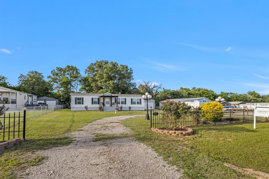 Turn key 3 bedroom 2 bathroom property located within a gated community; Holiday Villages of Fork on Lake Fork! Perfect for the family looking to live the lake life or for the investor looking for a turn key vacation rental. Near by Airbnb and VRBO properties go for $150-$200 a night or more! With a spacious open living concept fantastic for large gatherings you will not be disappointed with all the features this home has! On property you will notice a 30X40 separate garage or workshop perfect for all the lake toys you can think of! Boat and RV parking on property with a circle drive for guests. Also an additional separate 12X16 storage shed located in the backyard. Community amenities features multiple fishing piers, boat ramp, clubhouse with pool table and games, outdoor pool, playgrounds, putt putt golf, basketball court and several picnic areas for large gatherings. Monthly potluck, karaoke and dances with live bands.