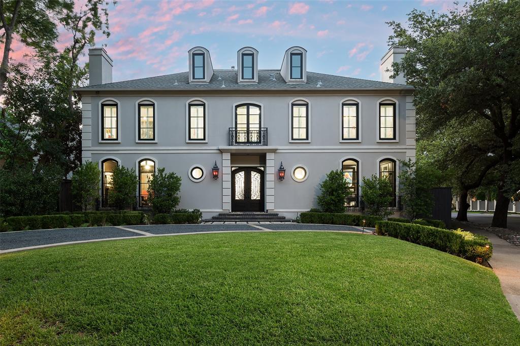 Situated on an oversized corner lot in Highland Park, this stunning French Contemporary showplace was extensively updated in 2022. The home boasts a sophisticated lively entry, with chic interiors features stepping down to a two-story foyer. The exquisite formal rooms, paneled study, and oversized great rooms welcome a wet bar open to a newly updated kitchen. The kitchen is equipped with Ann Sacks tile and premier stainless Thermador, Miele, and SubZero appliances, as well as a large breakfast area. The luxurious master suite includes a private balcony overlooking the yard. Three additional generously sized bedrooms, each with elegant baths and custom california closets. Also including five fireplaces, an outdoor patio overlooking a brand new pool with all new landscaping allowing for privacy for family and friends. The home completes itself with remodeled guest quarters above the garage, complete with its own private entrance, perfect for extended family or visiting friends.