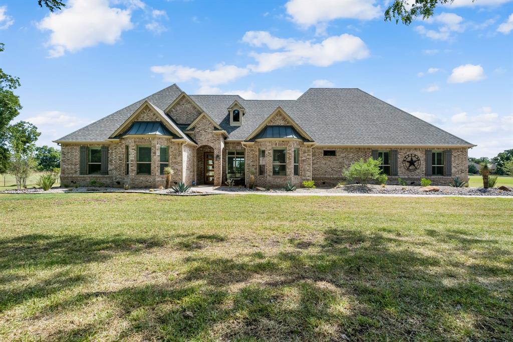 The sky is the limit- at this immaculate custom home nestled within the highly sought-after and prestigious Driftwood Ranch, a luxurious gated airpark community. The community features a paved and lighted 3,000 ft long runway, private paved boat launch leading to the iconic Brazos River and headwaters of Lake Granbury (perfect for watersports!)
This estate is perfect for the entertainer, with a chef's kitchen out of a magazine featuring high end appliances and expansive 8ft island. Throughout the home you will notice beautiful woodwork, Plantation shutters, Wood Inspired Tile, Quartz Countertops, and Designer Lighting.  The home is centered around the pristine back yard, with a grand pool- complete with a 12x12 Cabana, Fire features, Waterfall grotto, Bar area with bench seating, Hot tub, and Tanning ledge. Large 60x60 insulated Private Hangar with epoxy flooring, full bathroom, and a large 50x14 Hydraulic Door that opens up to the paved runway! Full Spec Sheet in Transaction Desk.