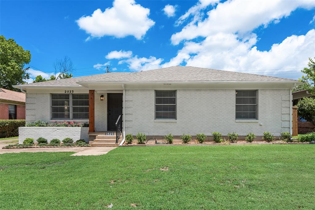 Welcome to this beautiful Dallas home where thoughtful renovations, timeless character, and true move-in readiness come together. Situated on a generously sized lot with a large landscaped front yard, this property offers outstanding curb appeal with its freshly painted white brick exterior and inviting presence. A side driveway leads through a private fenced entry to the detached two-car garage, providing added privacy and functionality. The garage also features a dedicated shop area, perfect for hobbies and projects. Inside, you’ll find a well-designed floor plan where every inch of the home’s square footage has been carefully enhanced to maximize comfort and usability. Rich wood flooring flows throughout the living spaces, while durable tile flooring is featured in the bathrooms. The renovated kitchen serves as the heart of the home and showcases stainless steel appliances, upgraded cabinetry, modern hardware, and a stylish backsplash that blends both form and function. The refrigerator, washer, and dryer will convey with the property, making your move even easier. Natural light fills the interior, creating a warm and welcoming atmosphere. Step outside to enjoy the spacious backyard, complete with a wood privacy fence that provides plenty of room for entertaining, pets, gardening, or future outdoor enhancements. Whether hosting friends and family or enjoying a quiet evening outdoors, this backyard offers endless possibilities. Buyers will appreciate the peace of mind that comes with major system updates. The HVAC system, water heater, and roof were all replaced in 2022, helping reduce future maintenance concerns. With easy access to Interstate 635, this home offers quick connectivity to shopping, dining, employment centers, and entertainment throughout the Dallas area. This property presents a fantastic opportunity for buyers seeking a truly turnkey home. Don’t miss your chance to make this meticulously maintained residence your own!