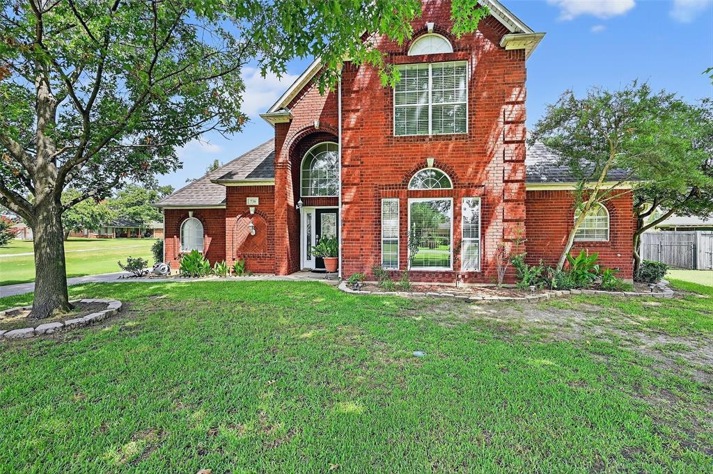Location, location, location! This custom two-story brick home, has it all. Some of the wonderful features include 10 foot ceilings, crown molding throughout, formal dining area and home office or library as well. The beautiful entry invites you in with a wall of back windows looking out across number 12 green of the golf course and down the fairway. The spacious living area features a gas, log fireplace, tons of storage and built-in cabinets. Your kitchen features a cozy breakfast area, black appliances, breakfast bar and a view of the lake out the window. The formal dining area has windows that look out your front yard that has 2 large mature trees. The large master bedroom features, separate vanities, corner tub, walk in shower and walk-in closet. The secondary bedrooms features a Jack and Jill bathrooms with tons of counter space in storage. Another great feature is the covered back patio that overlooks the fairway and the beautiful landscaping. The three car garage is behind the home with a side swing driveway that has room for boat and or RV Parking at the rear. A bonus feature of this home is tornado shelter as well as storage galore with three different attic spaces. Lake Kiowa is a gated community with 24 hour security making it a great safe, place to raise kids. With Golfing, boating on the private lake, swimming at the beaches, eating at the restaurant you will never find yourself bored. All facilities are included with POA dues. Come enjoy the lake Kiowa life style and call me your expert with over 50 years of Lake Kiowa heritage.